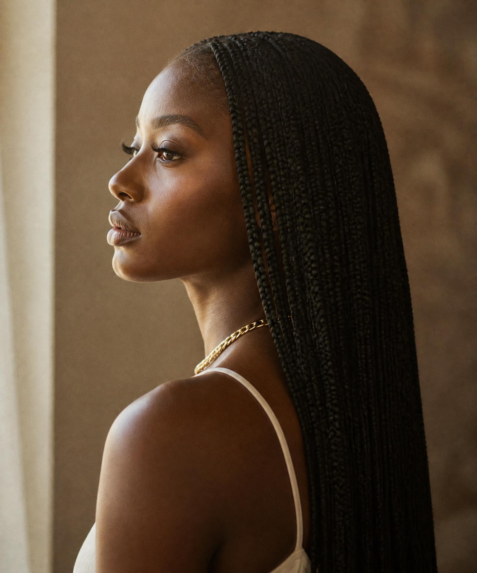 Placeholder editorial photograph of long, healthy knotless braids — replace with a professional portfolio photograph